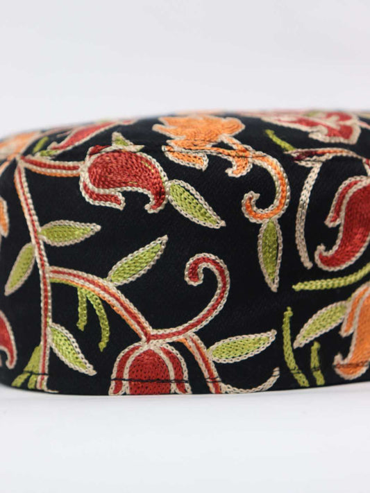 black cap in aari embroidery across sides