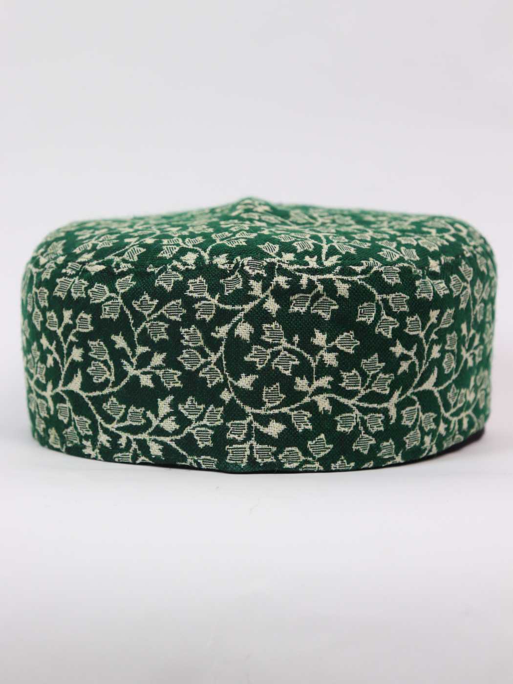 green kani cap with woven florals