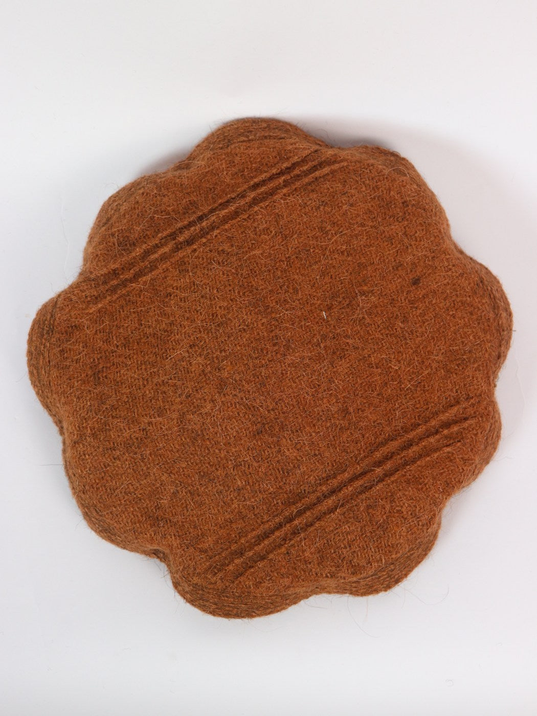 brown round cap in afghan pakol style top side