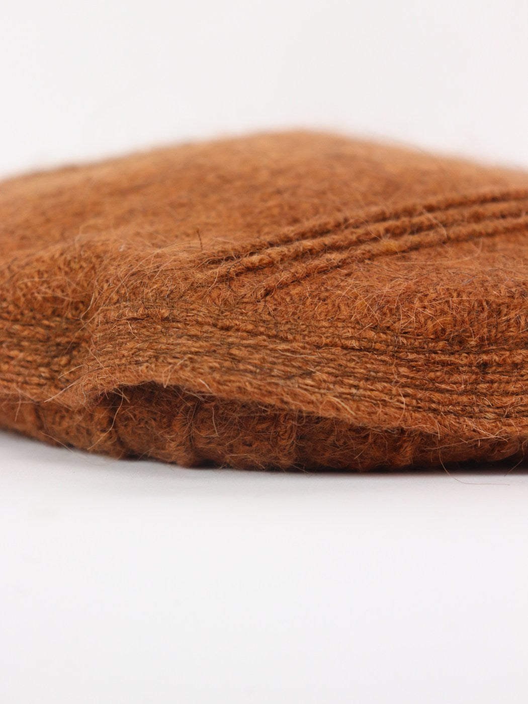 brown flat cap in afghani style pakol cap