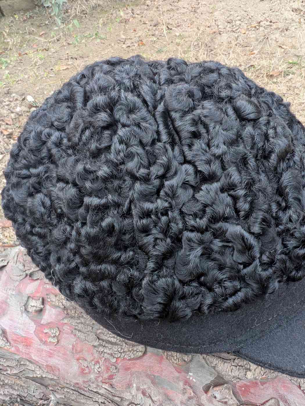 black cap in karakul fur