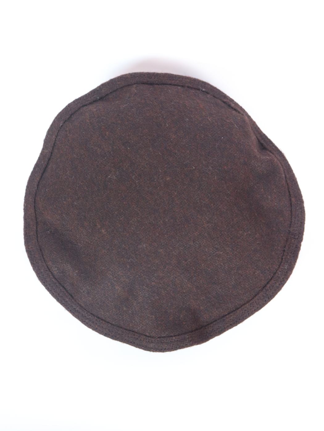 Afghani style cap in dark brown top side
