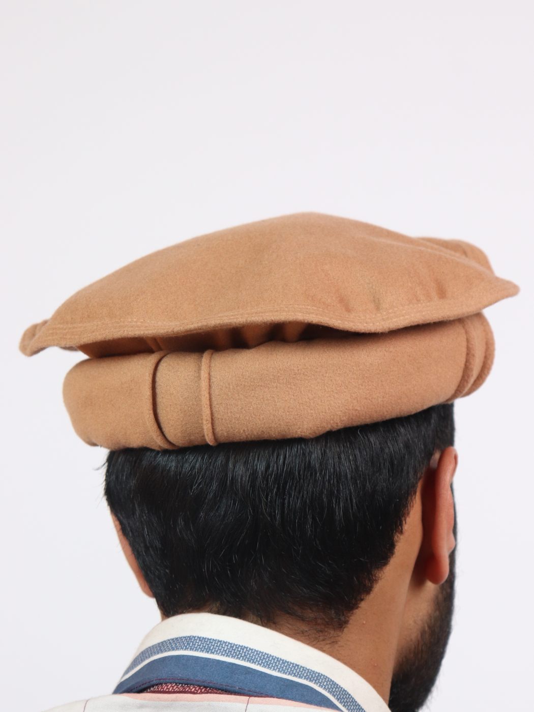 pakol cap in golden afghani style
