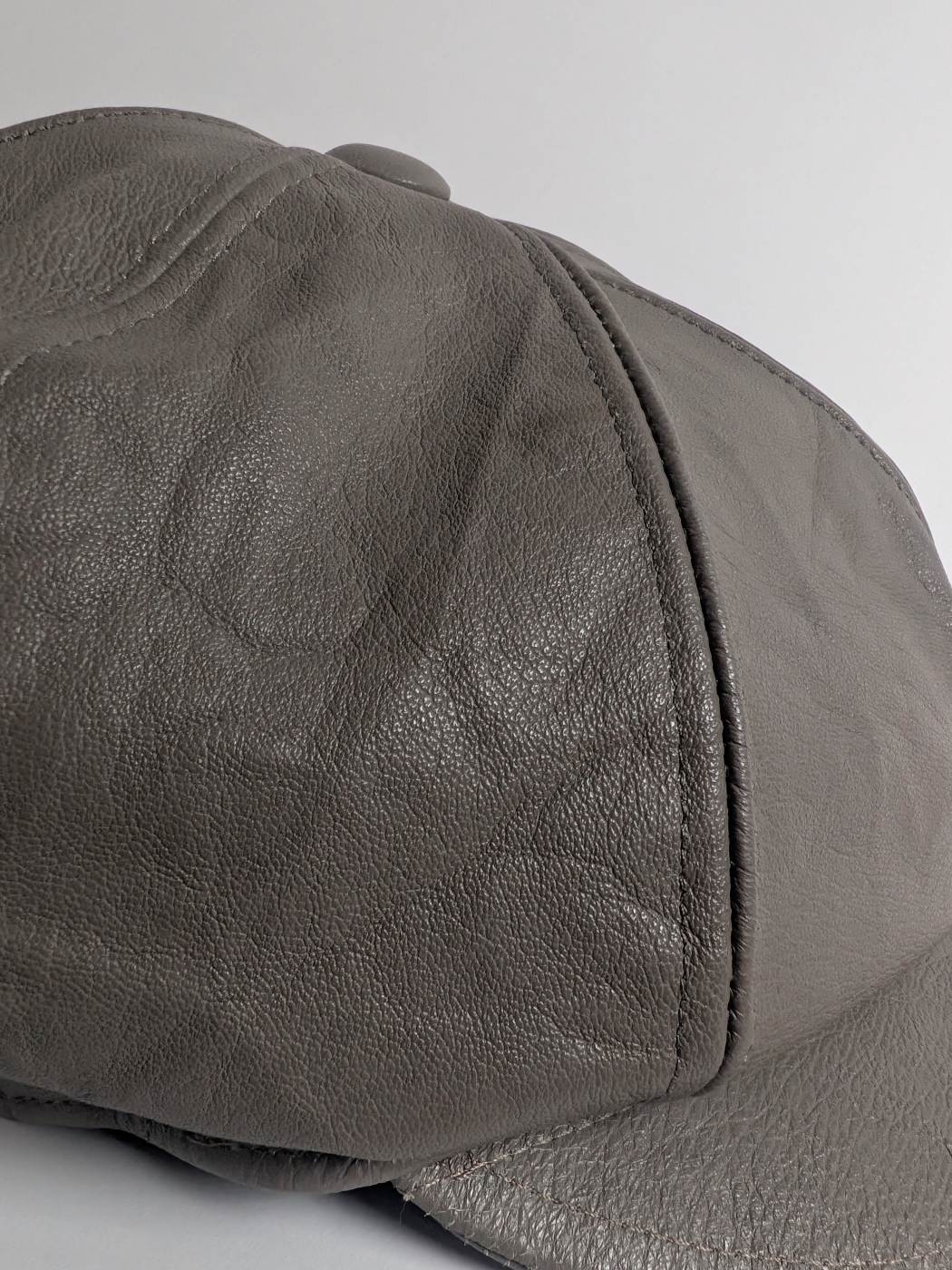 grey colour leather cap