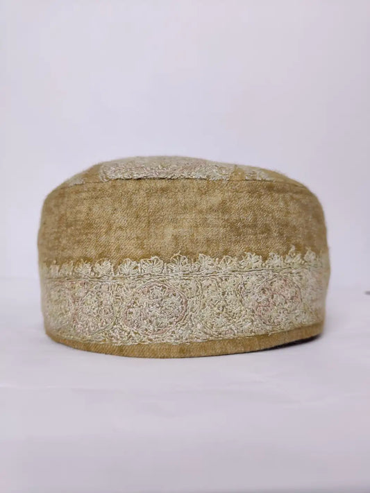 brown cap with hand sozni embroidery across sides