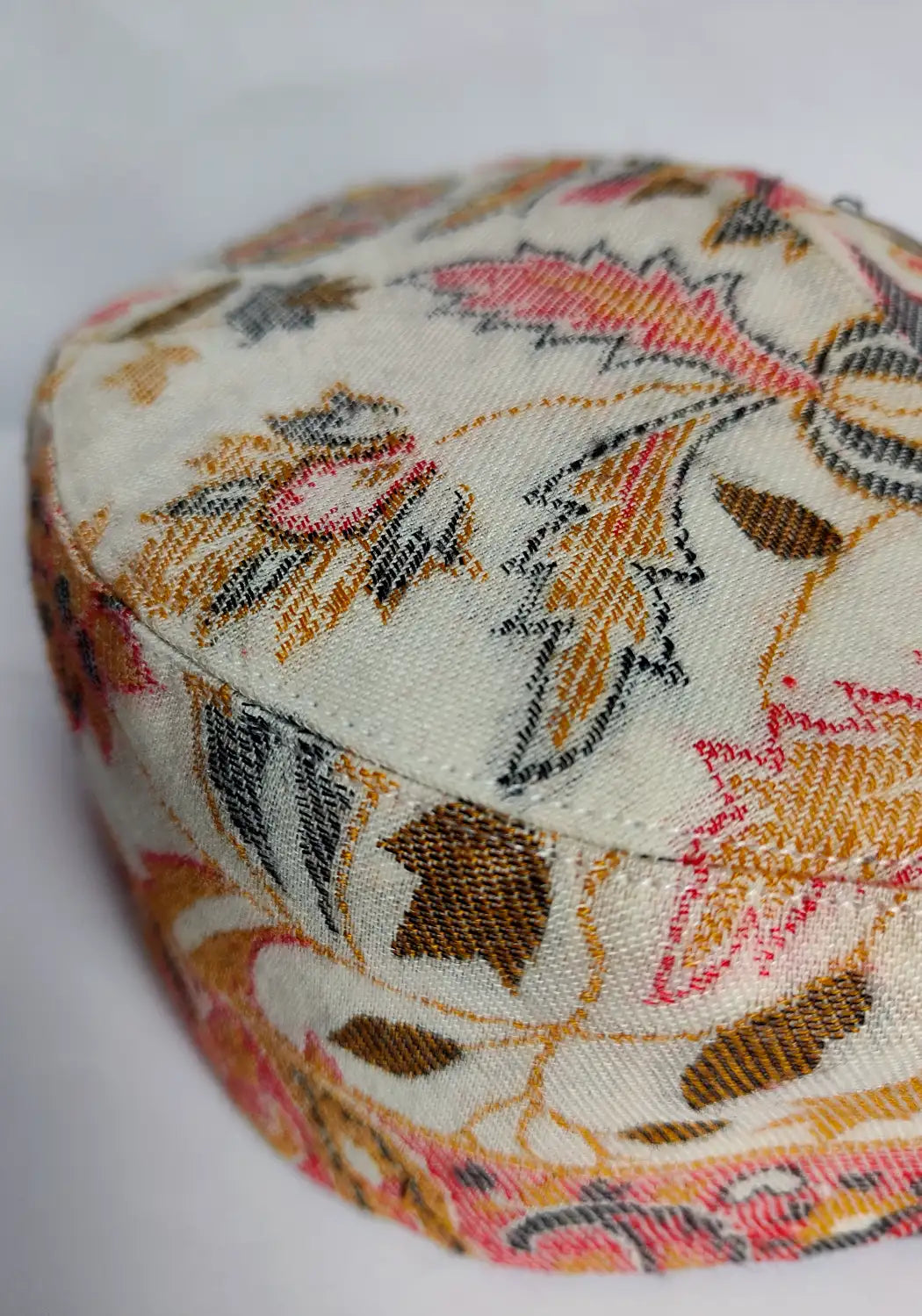 embroidery detailing of Kashmiri kani cap