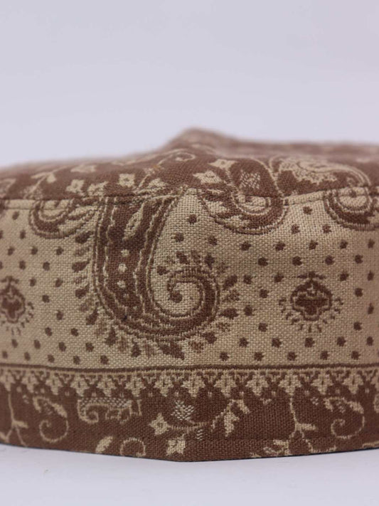 brown cap in floral motifs