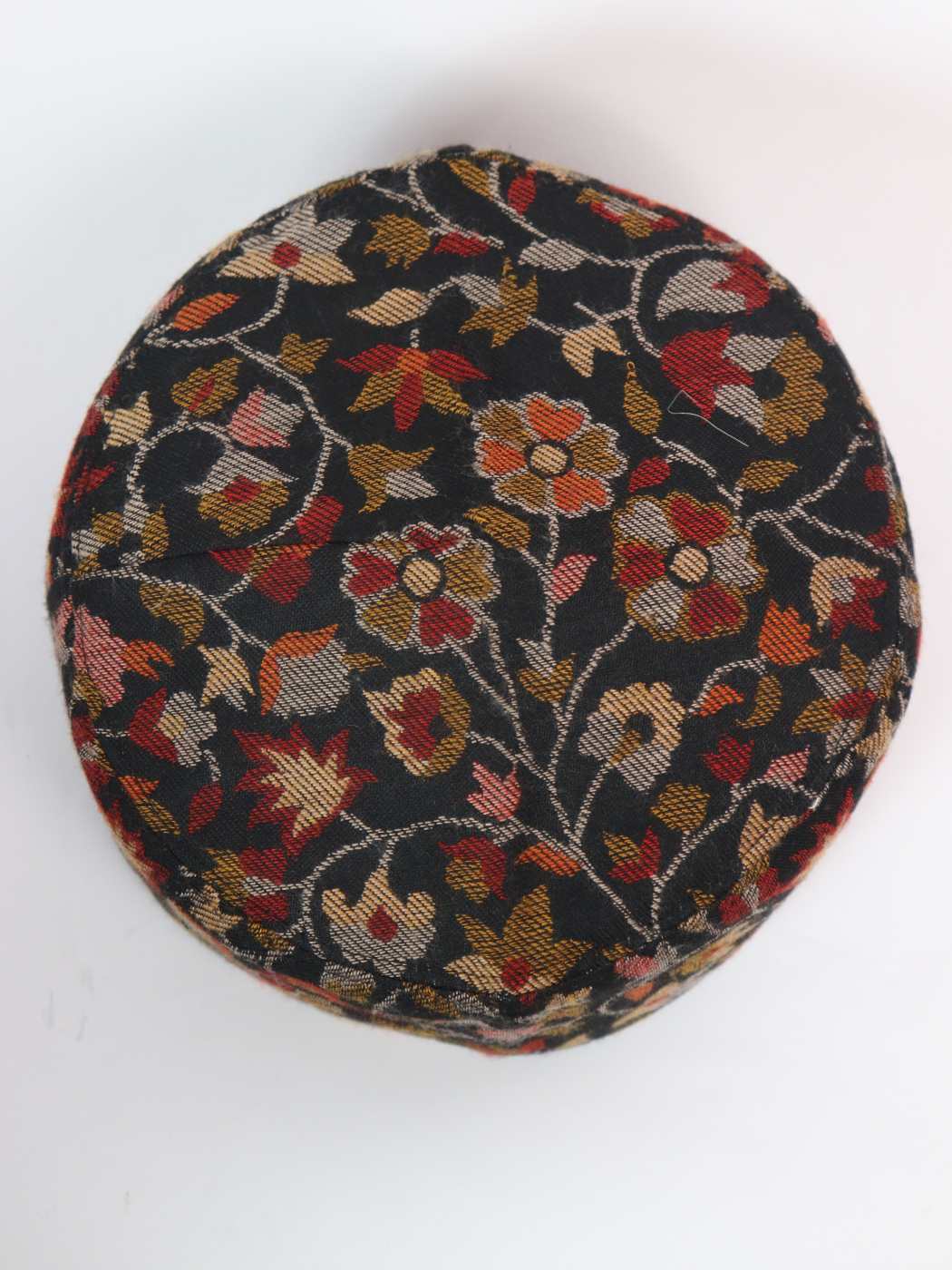 black cap in florals