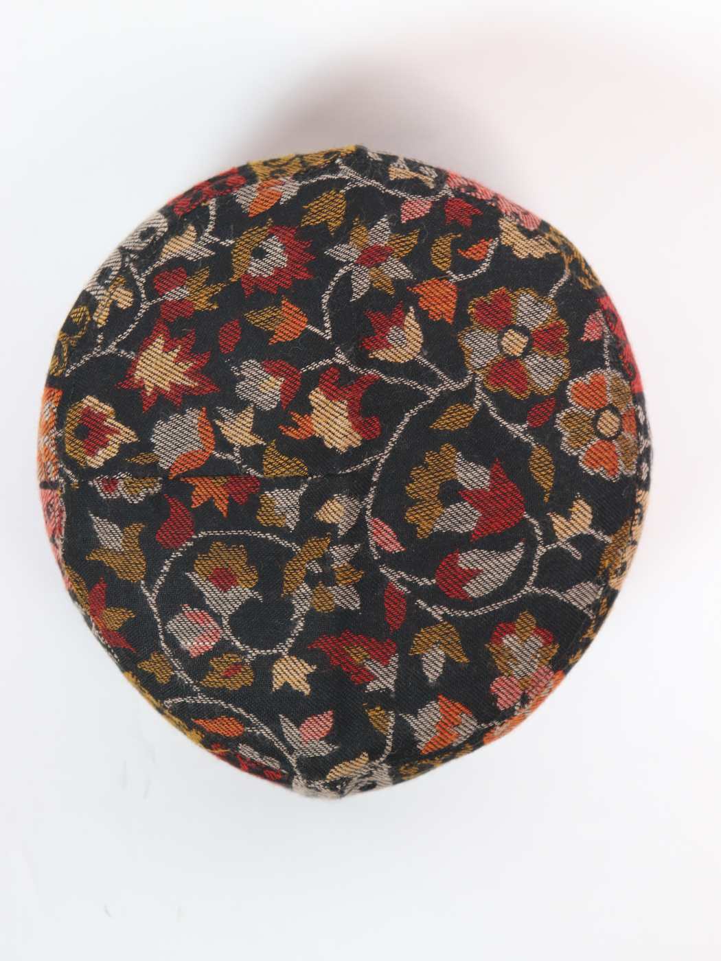 black cap in florals