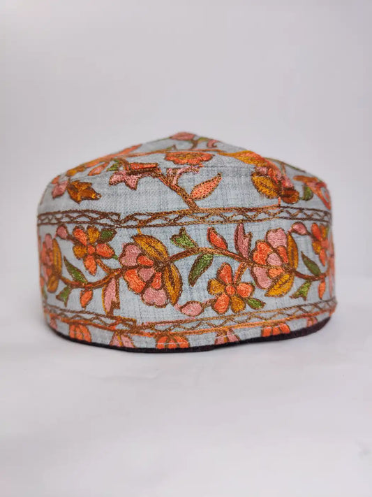 grey stylish cap with nalki aari embroidery across sides in gulab pattern