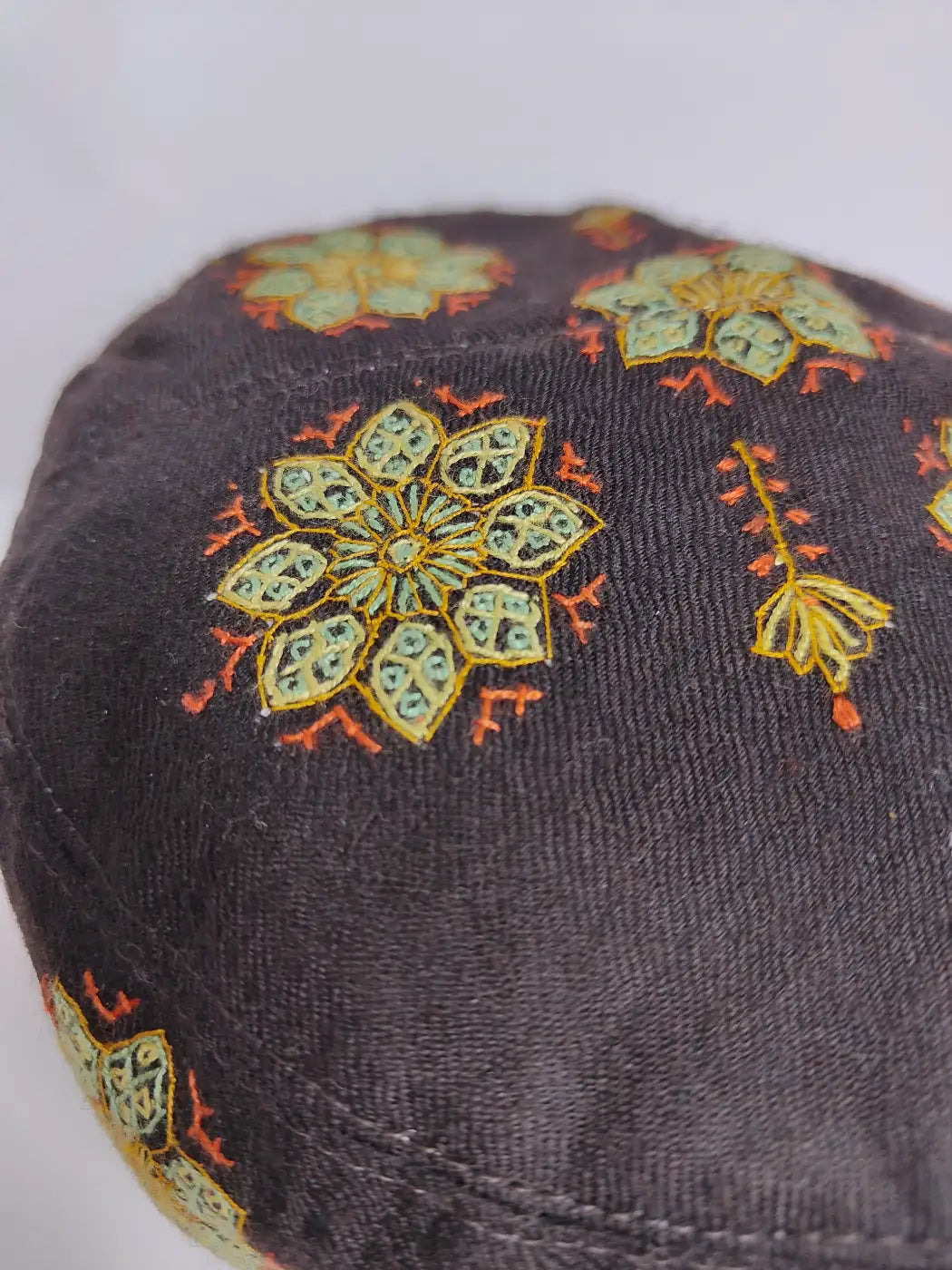 sozni embroidery on brown