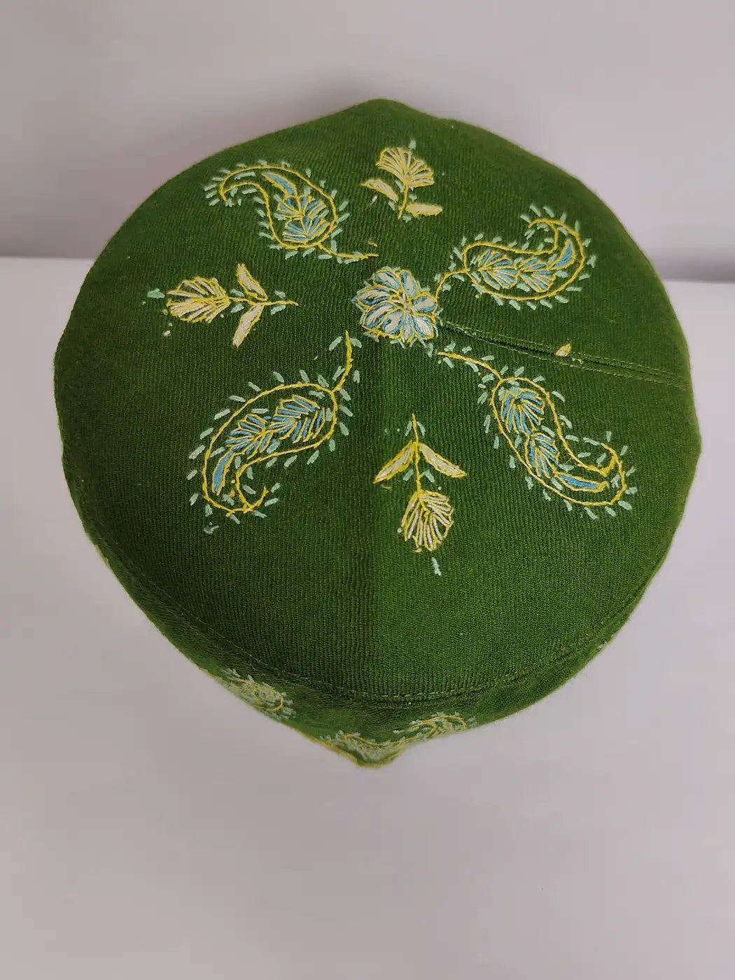 green Kashmiri cap with sozni top side embroidery