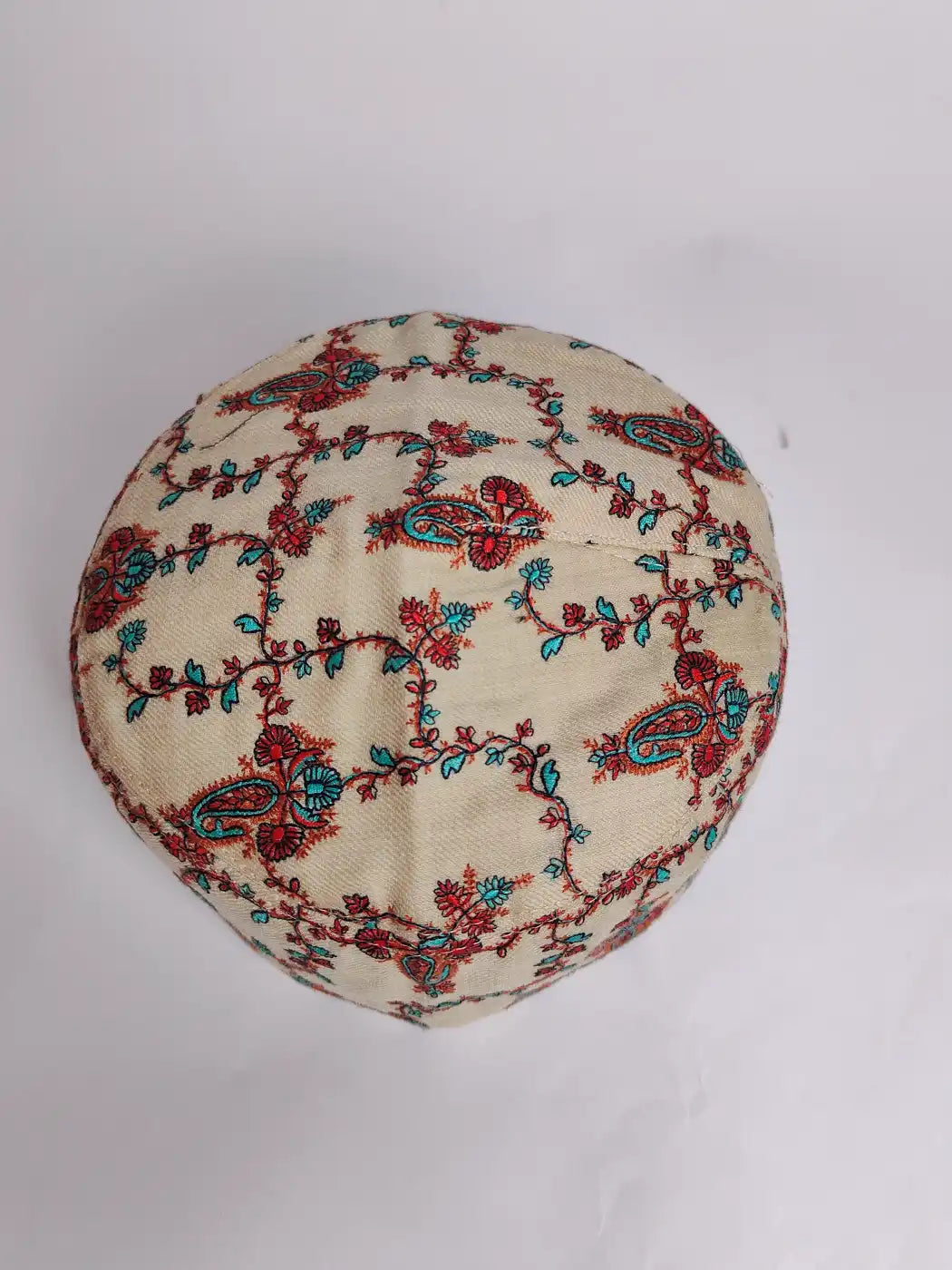 topi with Sozni embroidery on the top side