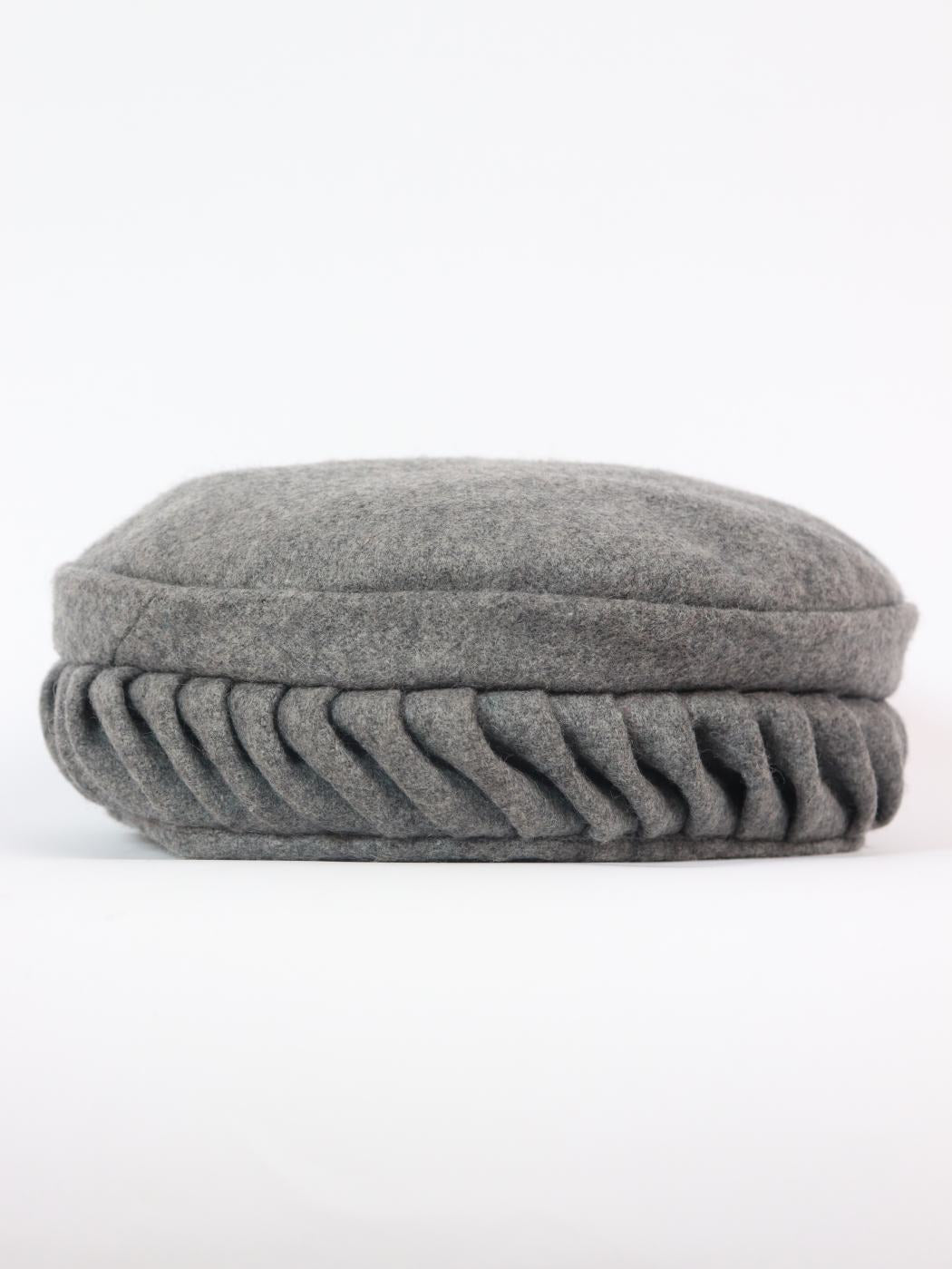 light grey cap in twisted pakol style