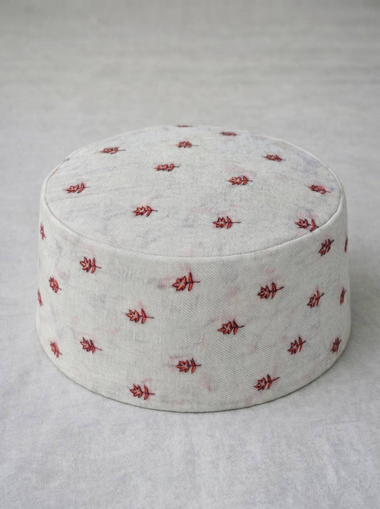 White topi with all over booti style sozni florals