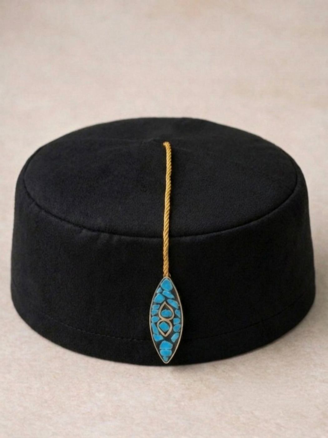 black turkish cap with turquiose tassle