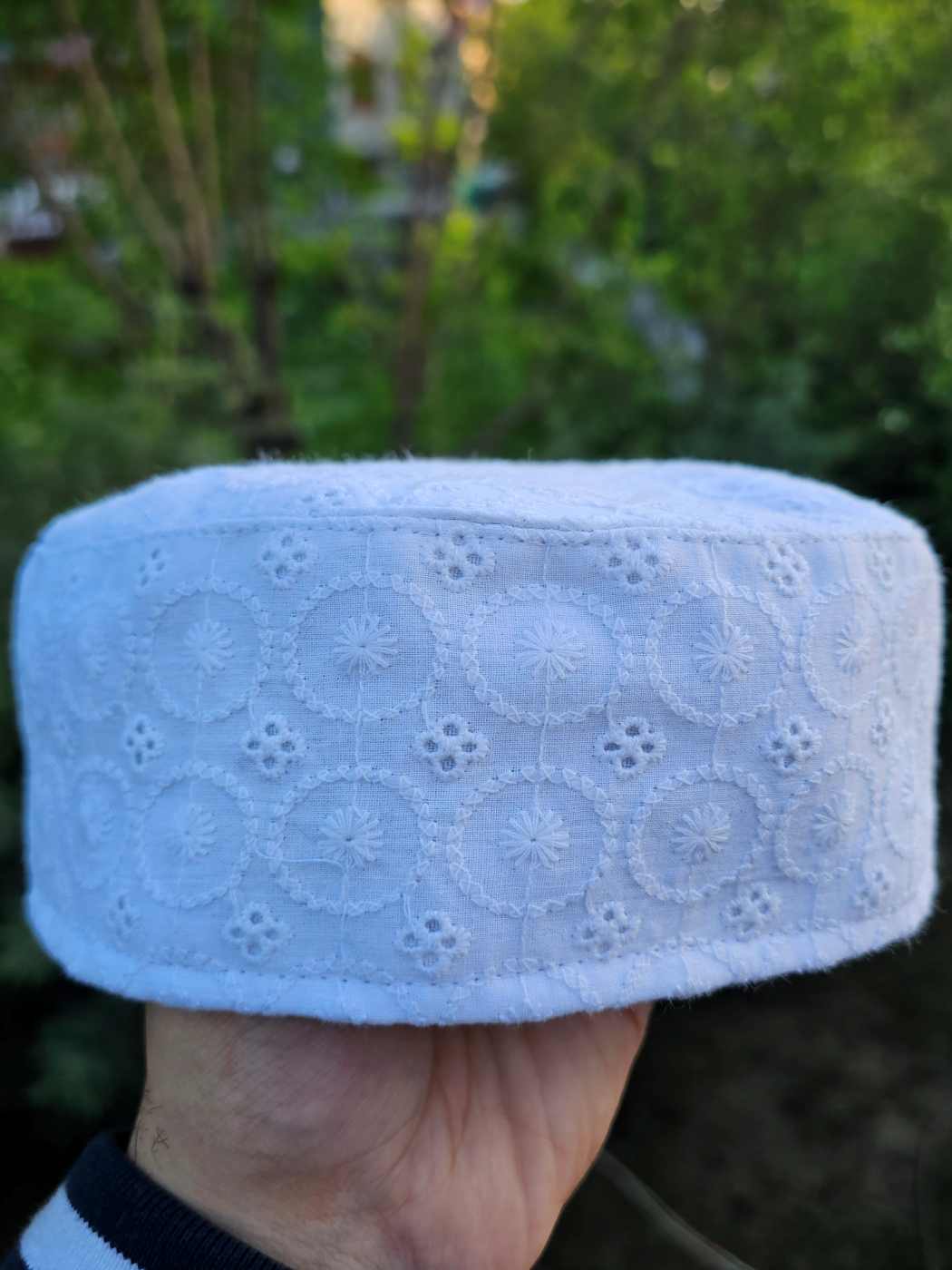 white hakoba pattern across sides of the Kashmiri summer cotton cap