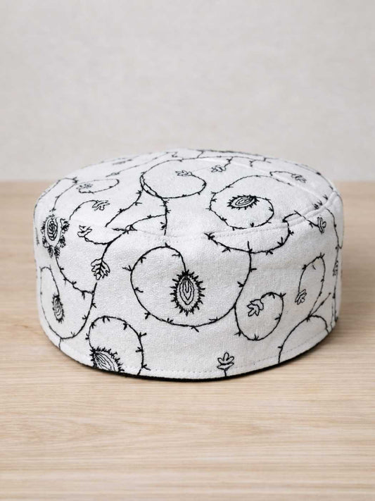 all over work white cap in sozni embroidery