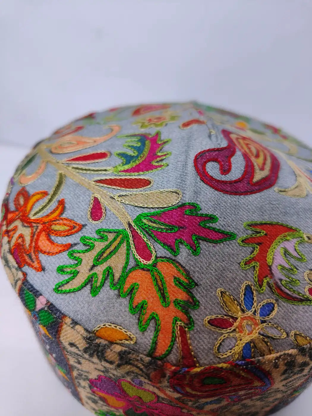 leafy pattern in kalamkari embroidery on the unique cap