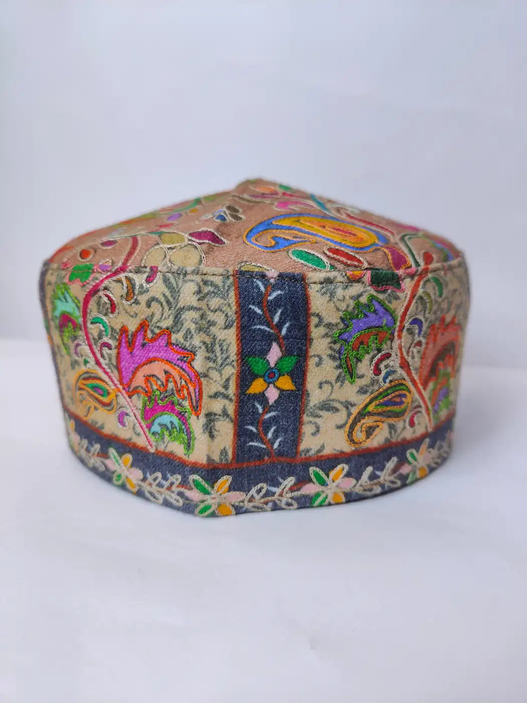 kalamkari embroidery on the sides of the kashmiri beige colour classic cap