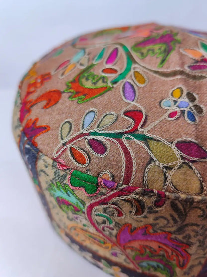 colourful kalamkari embroidery on the Kashmiri round cap 
