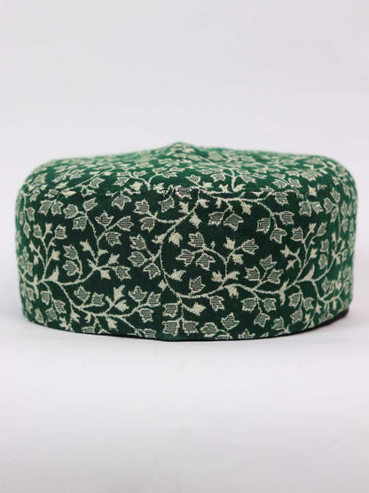 green kani cap with woven florals