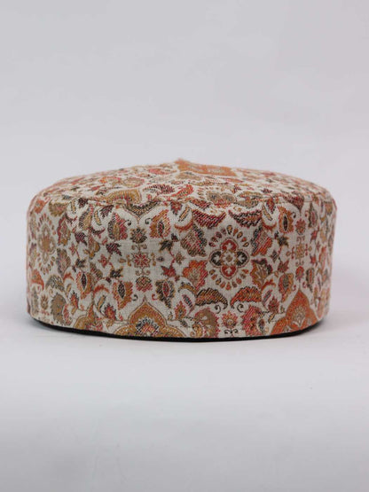 topi with kani woven motifs