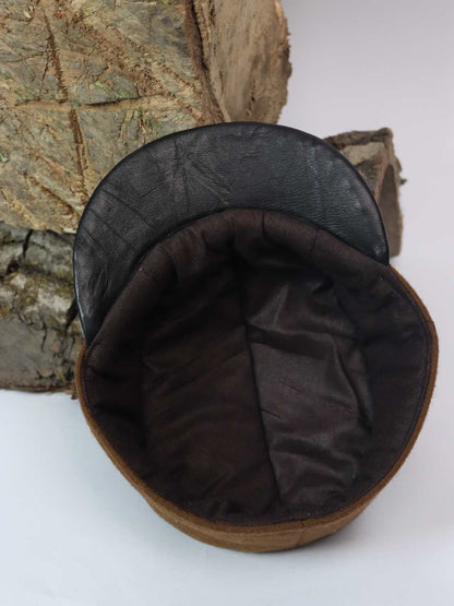 brown cap in leather and tweed wool inside lining 