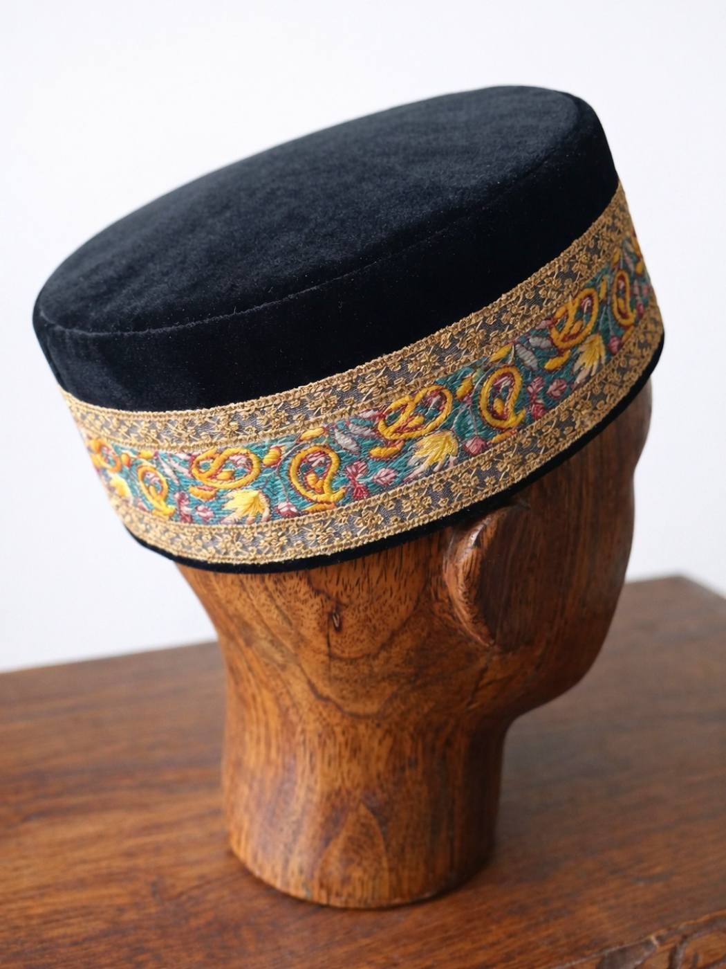 velvet round black cap with zari tilla embroidery across border