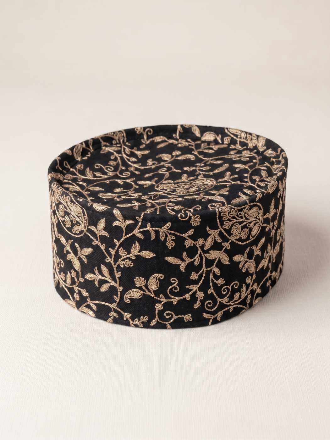 black round cap with zari work