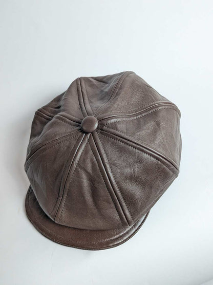 brown cap in leather