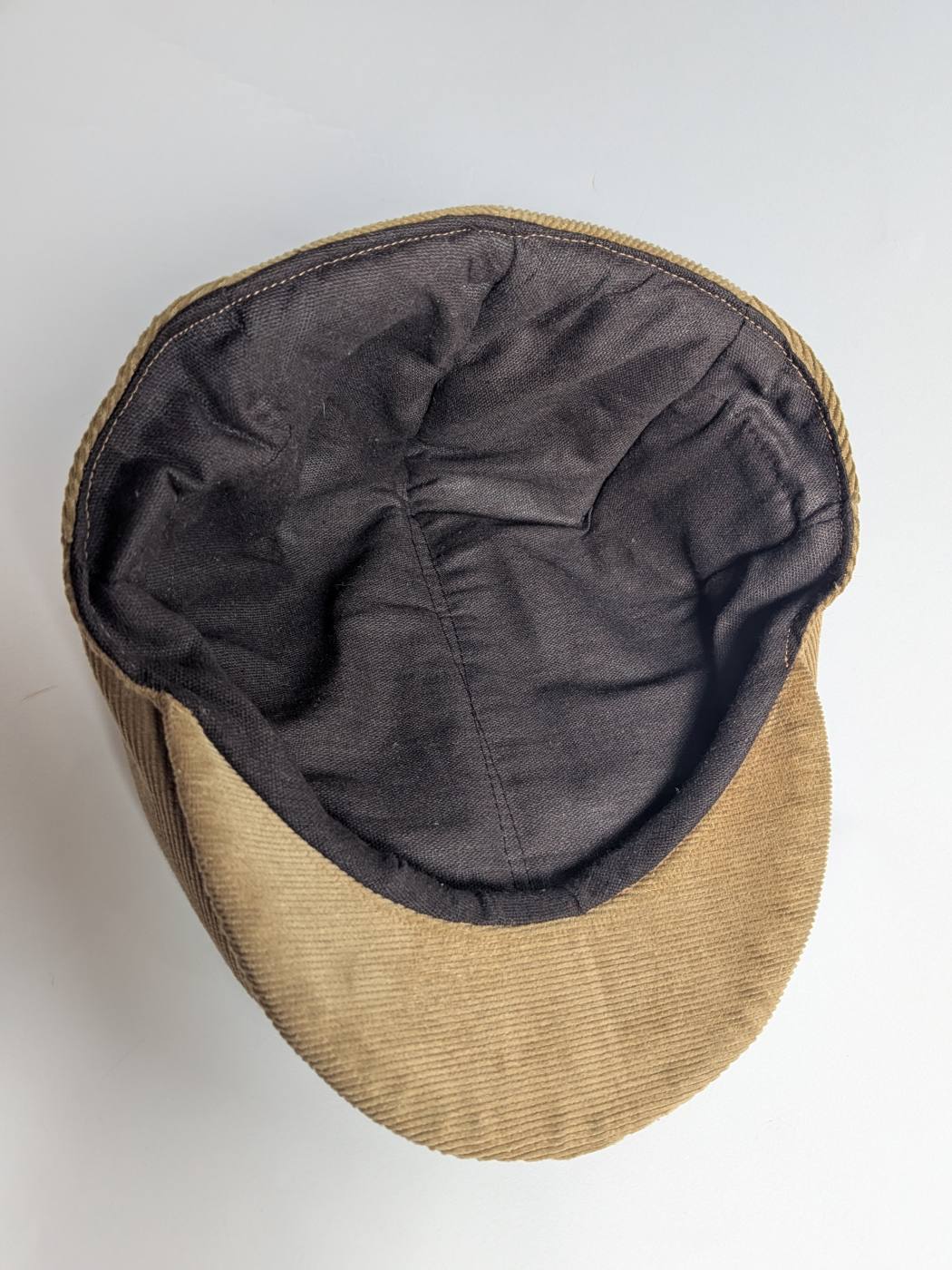brown flat cap inside lining lining