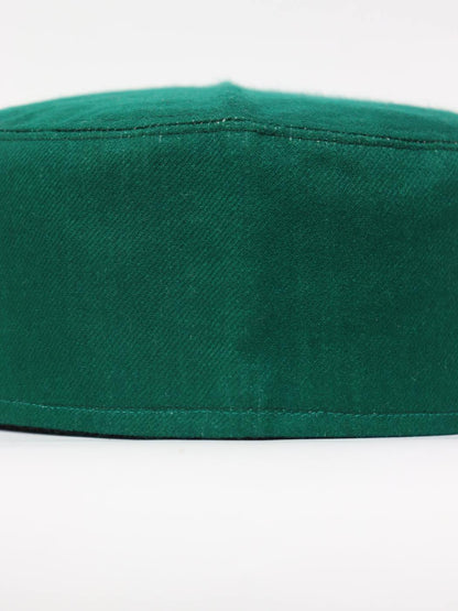 green cap in plain semi pashmina 