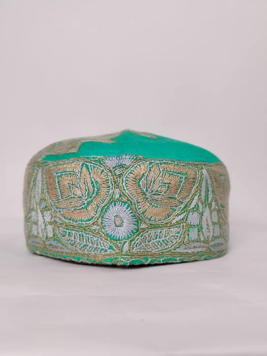 green cap from Kashmir with Sozni 