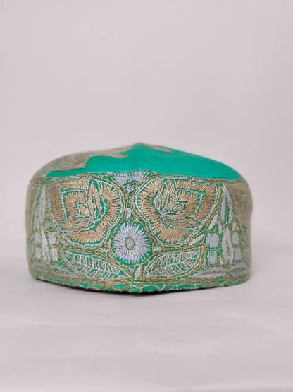 green cap from Kashmir with Sozni 