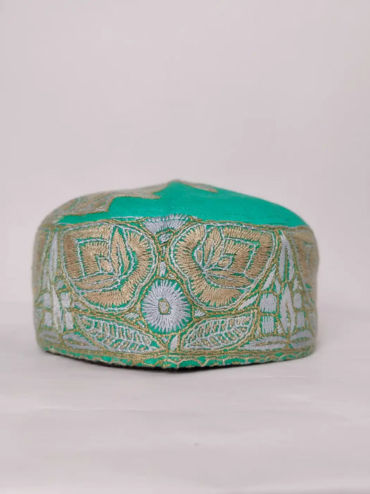 green cap from Kashmir with Sozni 