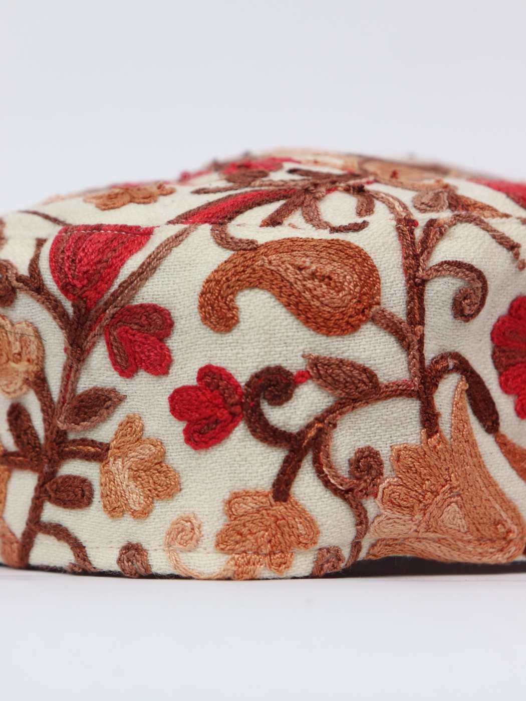 cream cap in aari embroidery 