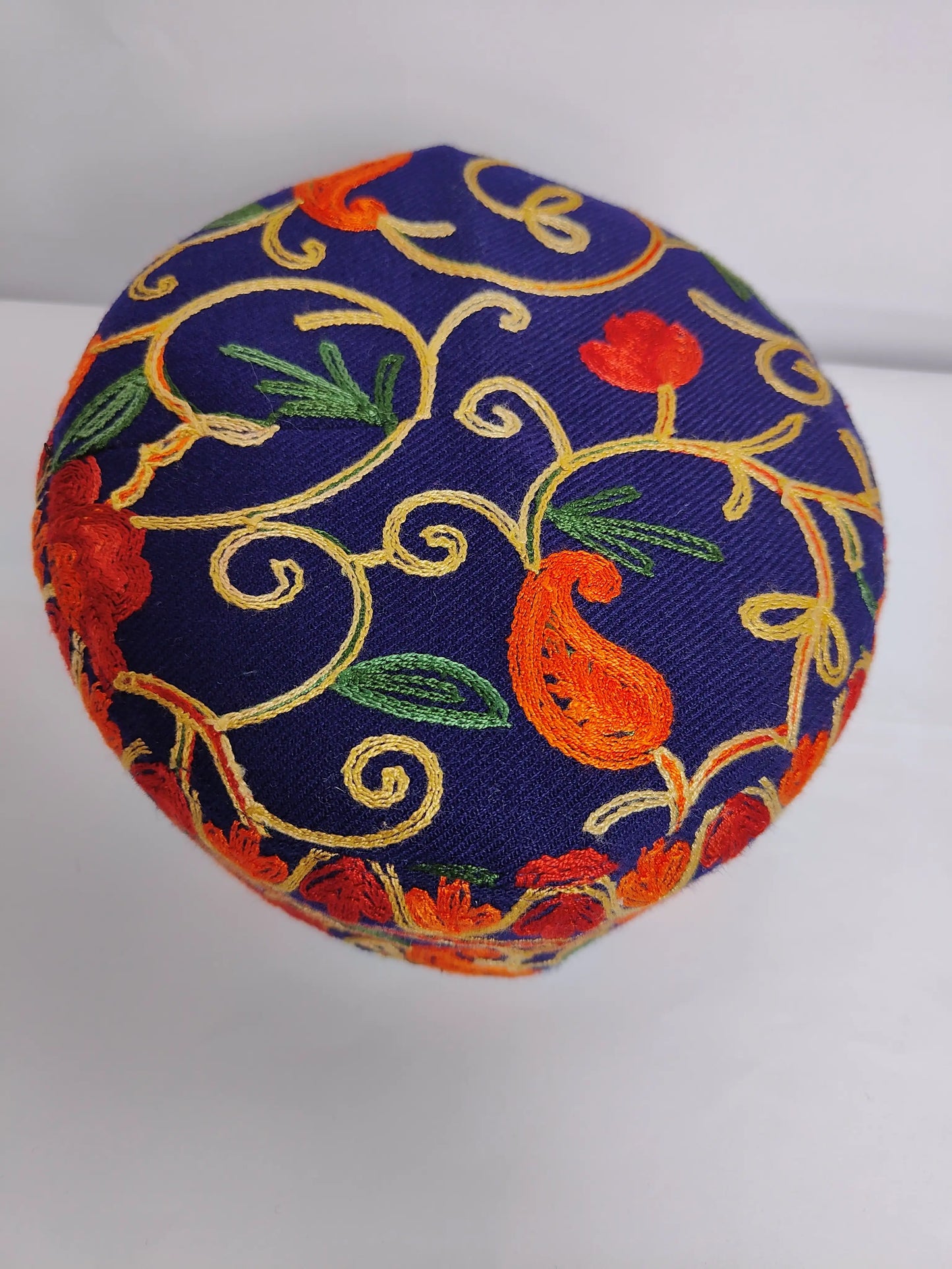 Kashmiri cap in dark blue with vine floral embroidery 