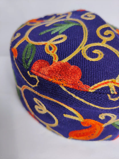 dark blue cap with aari work