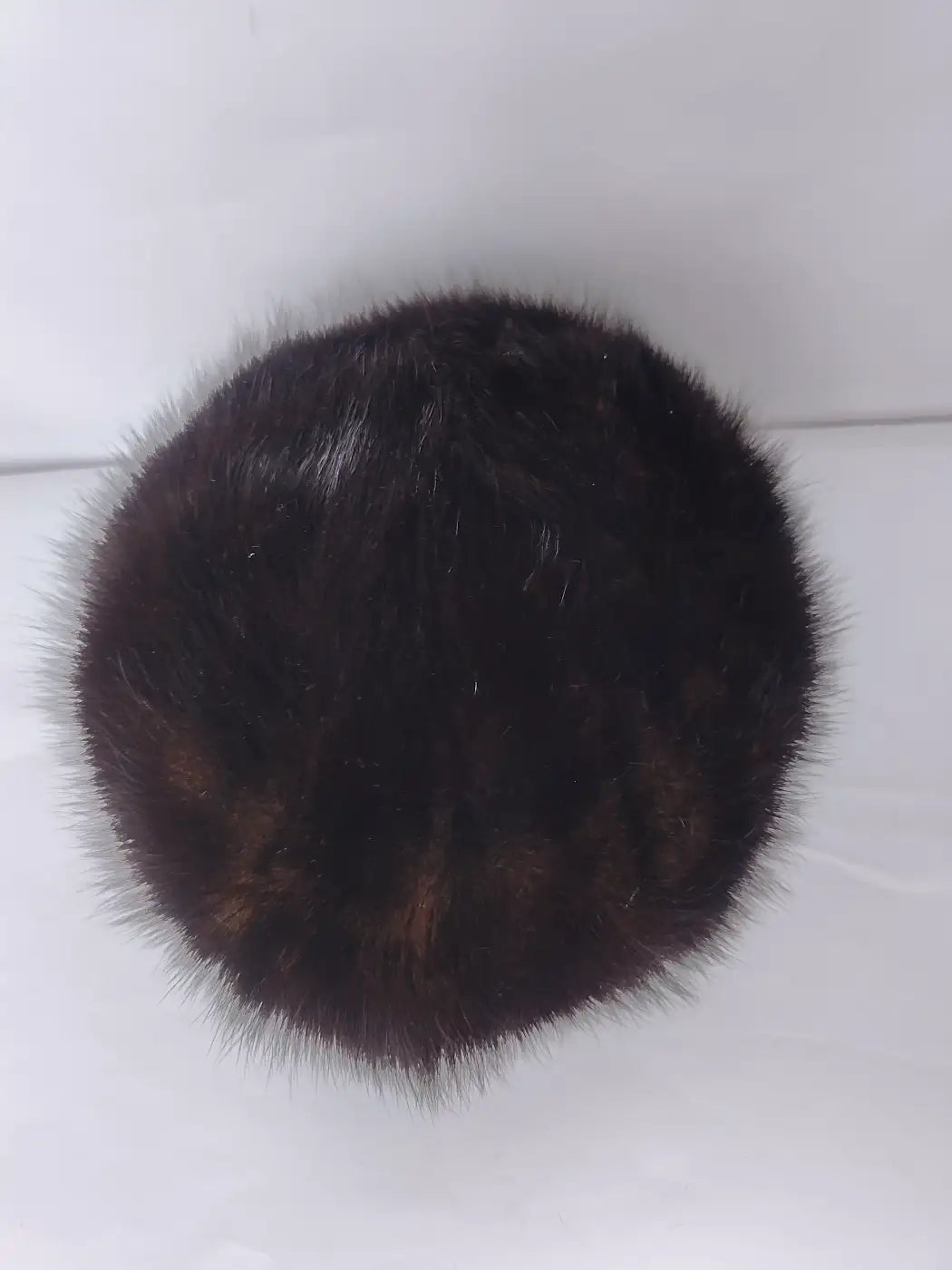 dark brown cap with fur