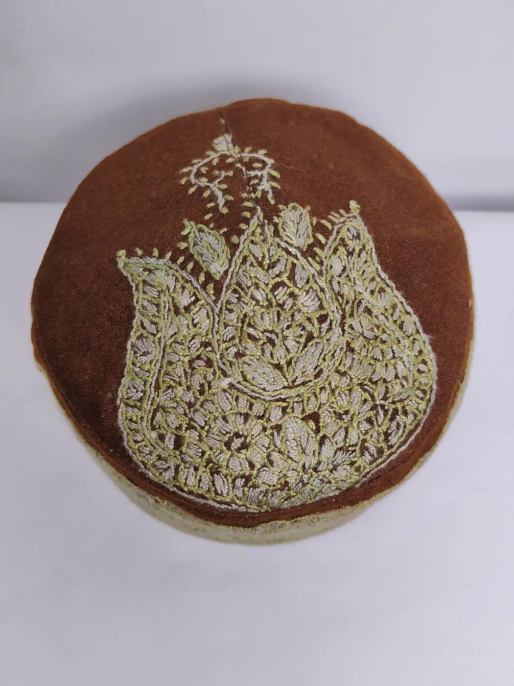 Kashmiri cap on top side in paisley motif on top side