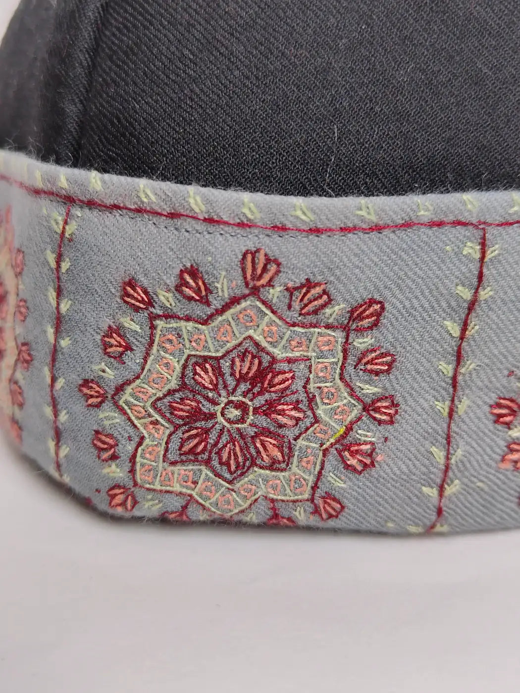 Hand sozni embroidery across border 