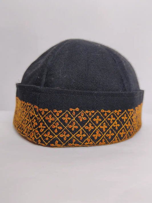 Kashmiri cap in black with geometrical sozni embroidery across border 