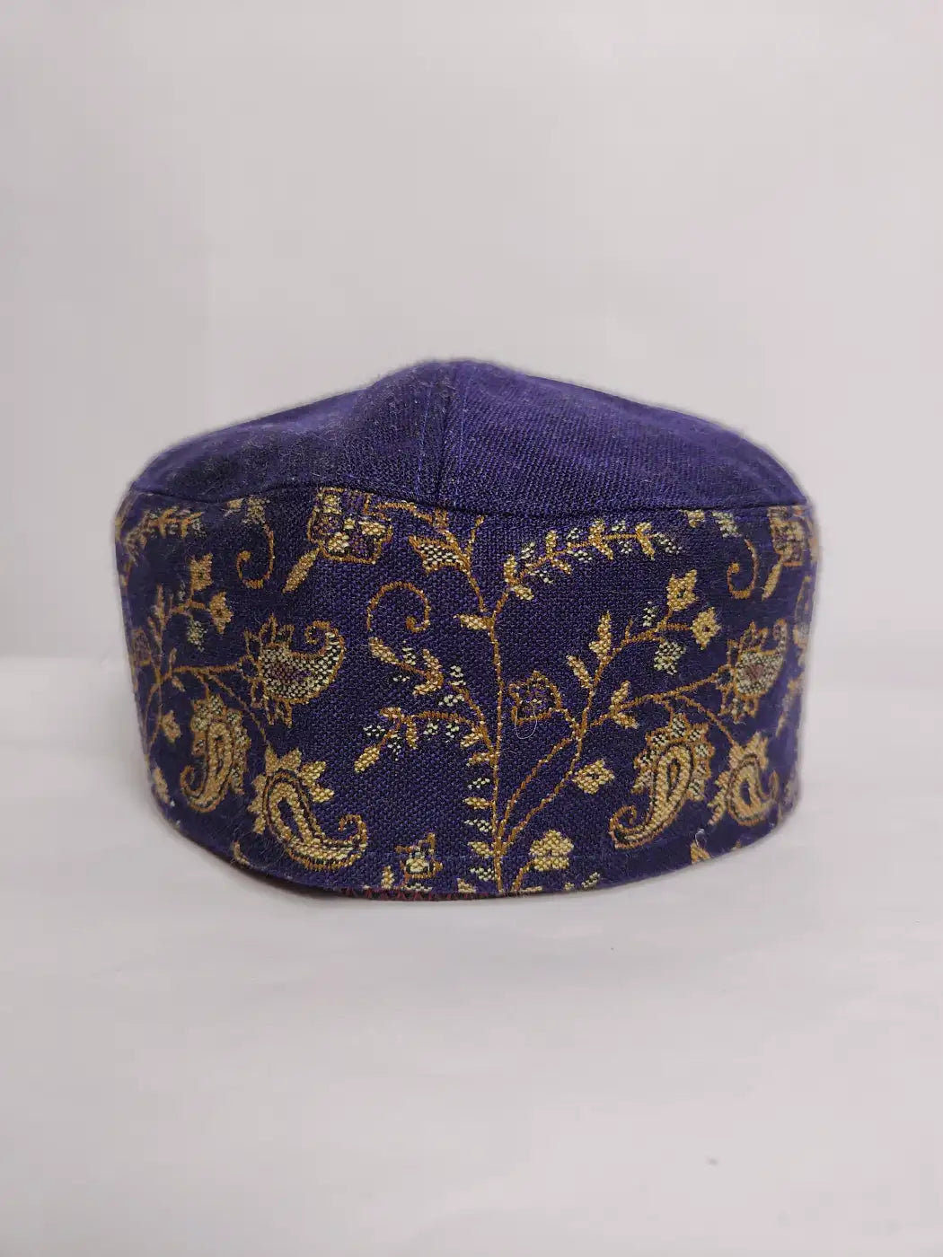 dark blue kani topi from Kashmir with vine pattern on sides 