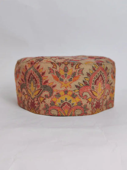 beige cap with kani woven florals