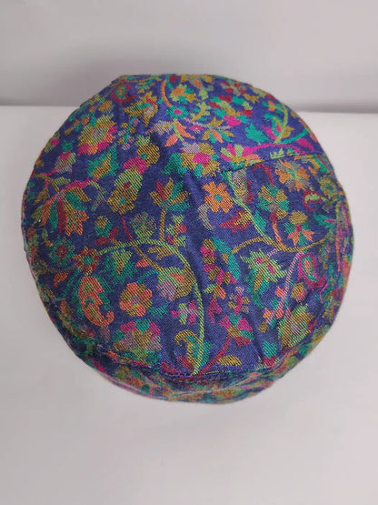 dark blue kani cap in florals from Kashmir with kani patterns on top side