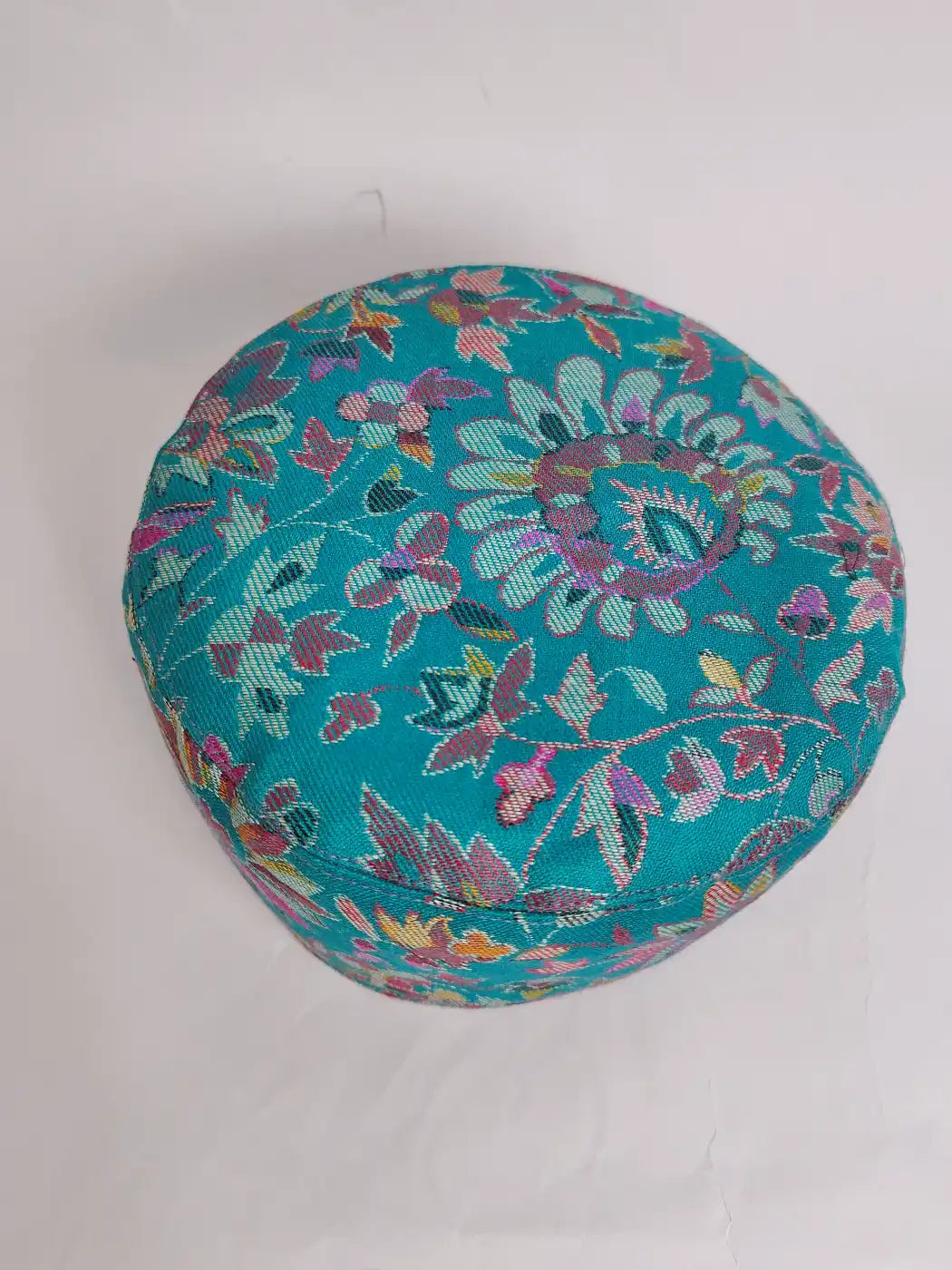 kani cap in sea green with floral patterns 