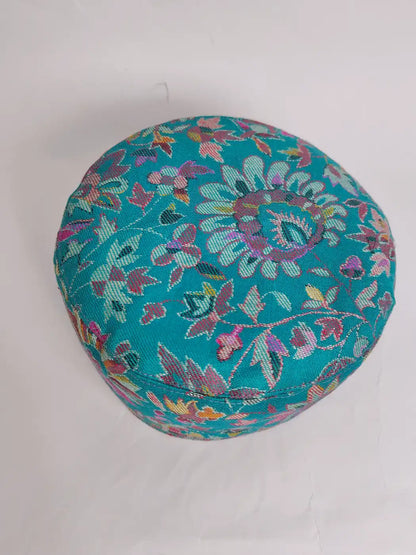 kani cap in sea green with floral patterns 
