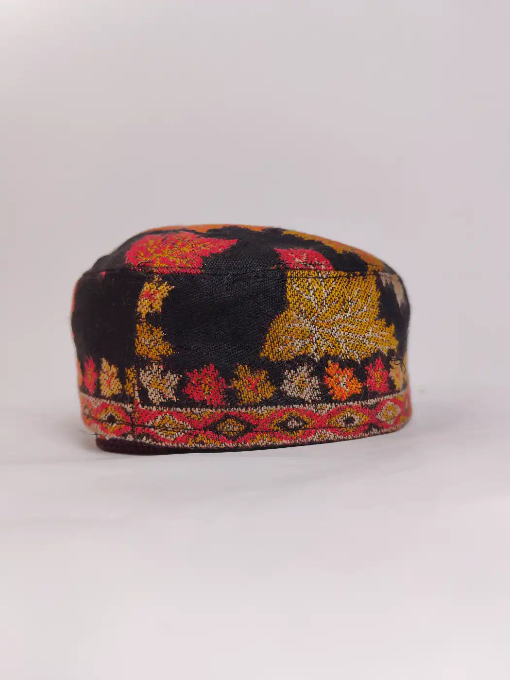 black kani cap in floral woven pattern 
