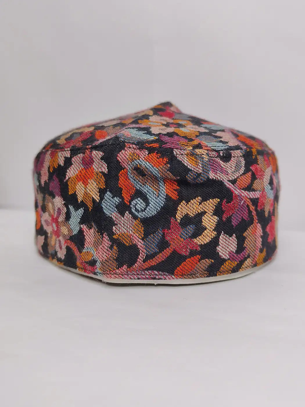 black Kashmiri cap in kani woven pattern 
